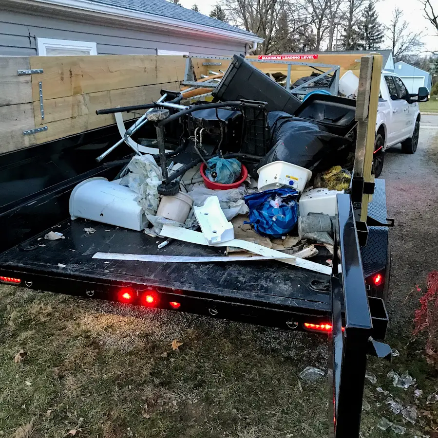 Roll-off dumpster delivered to a residential driveway in Cranford