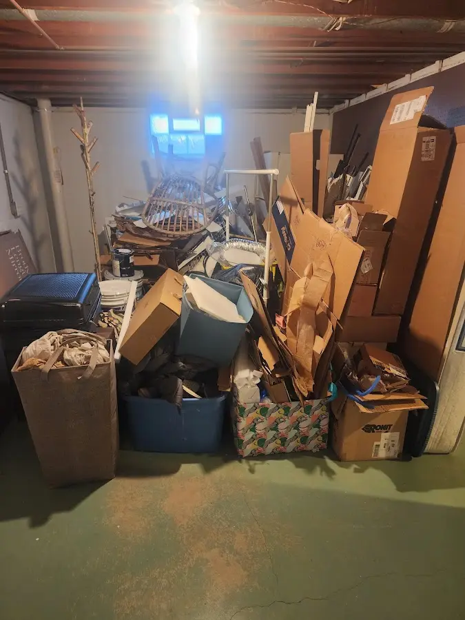 Roll-off dumpster container at job site for 6 Yard Dumpster Rental in Cranford